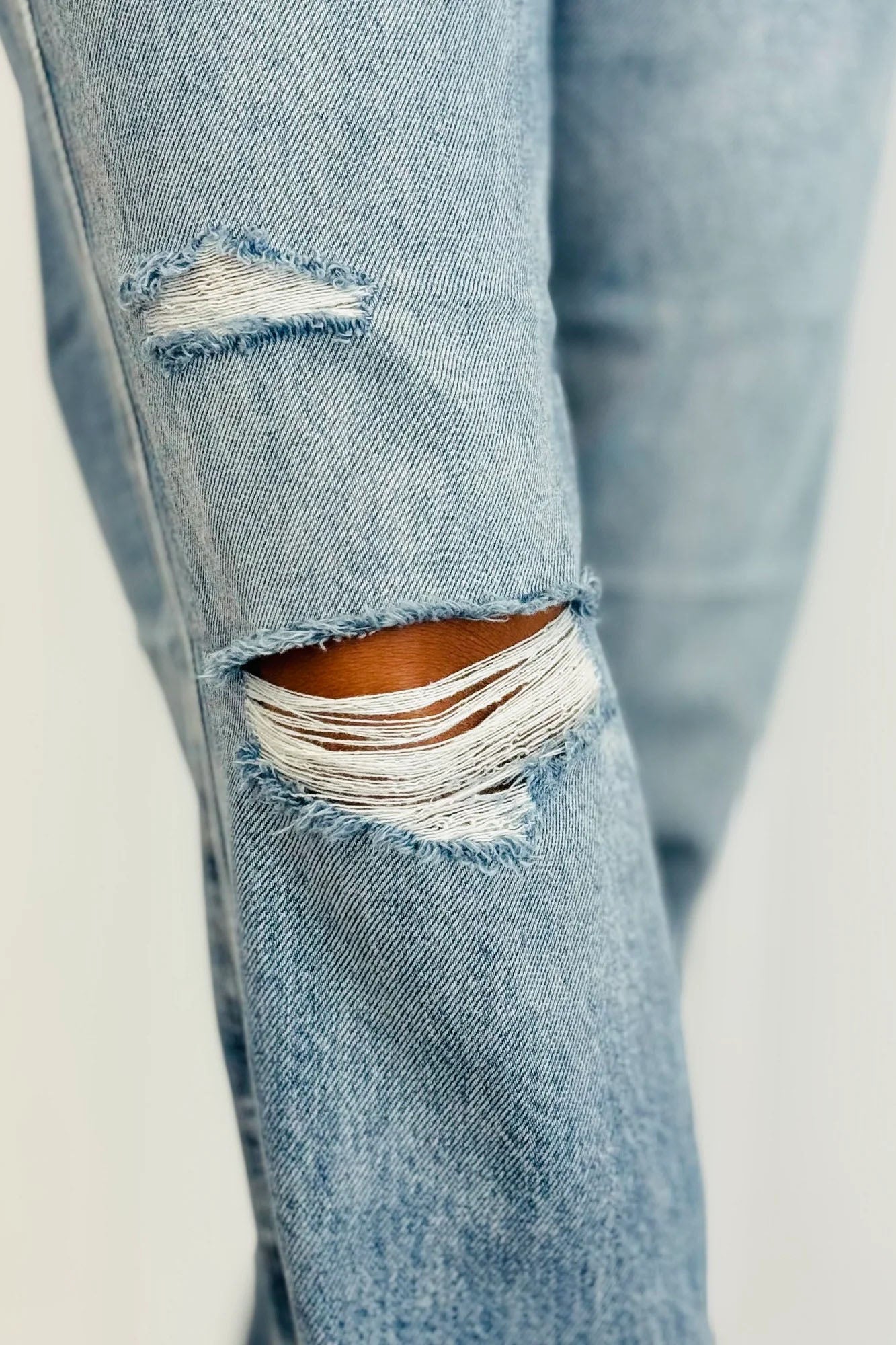 Mid Rise Distressed Straight Leg Jeans