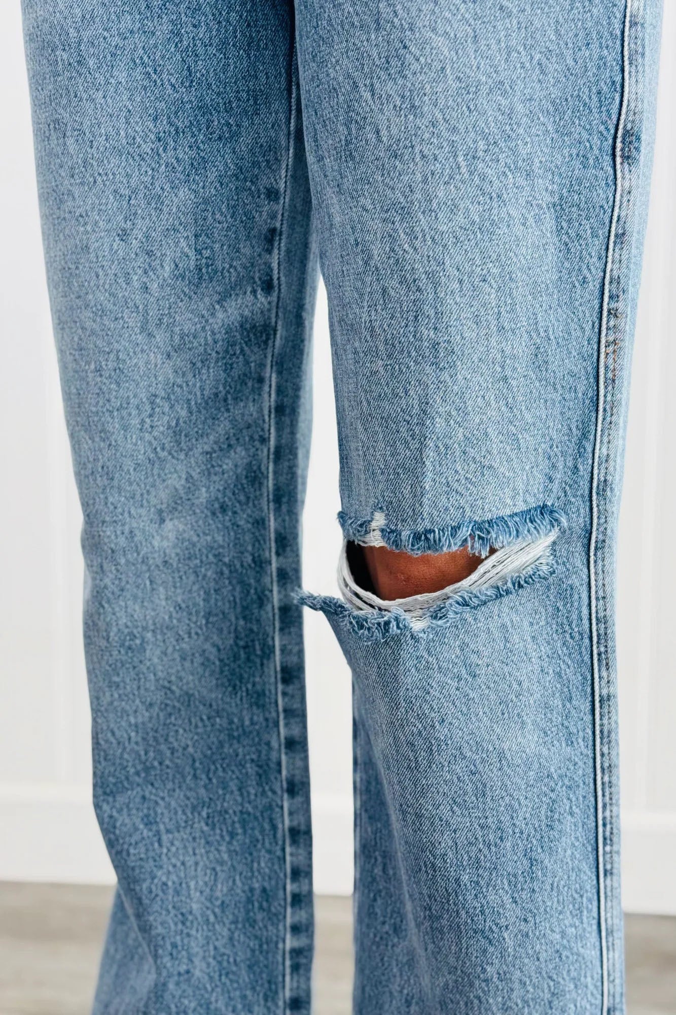 Cross Waist Ripped Straight Jeans